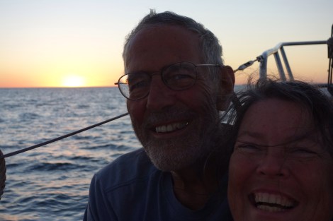 Sunset smiles after a long 33 hour trip and a fine fish dinner.